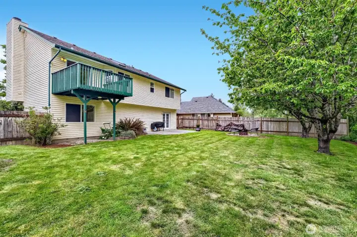 Fully fenced backyard offers privacy and room to enjoy.