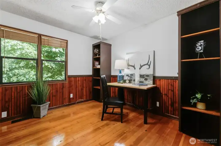 This versatile guest bedroom easily doubles as the perfect quiet home office for remote work.