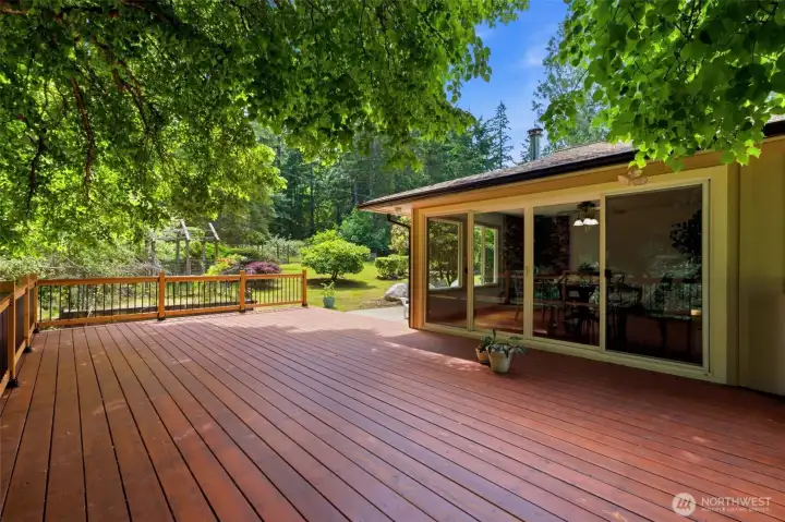 The oversized back deck offers the ultimate setup for summer BBQs, outdoor dining, and entertaining.