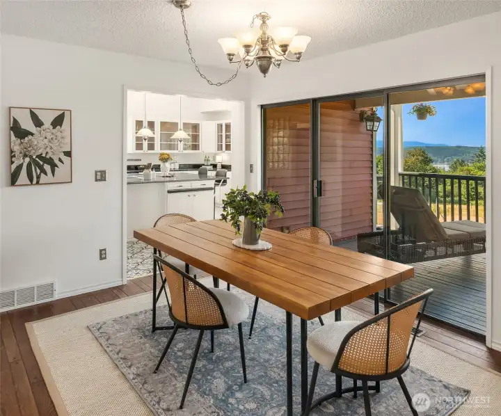 Large dining room with deck access