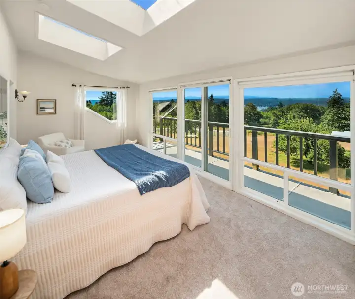 Primary bedroom with abundant light