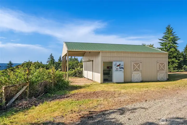 1200 square foot pole Barn, built in 2005, insulated roof with five stalls and storage loft and farmstand
