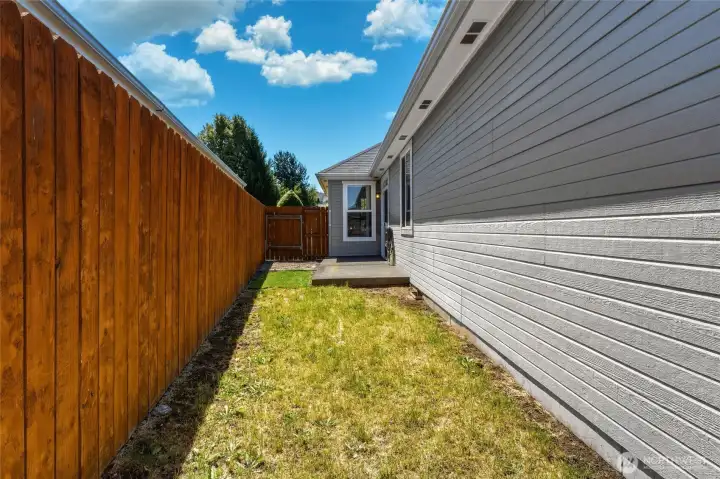 Low maintenance yard, perfect for raised garden beds.