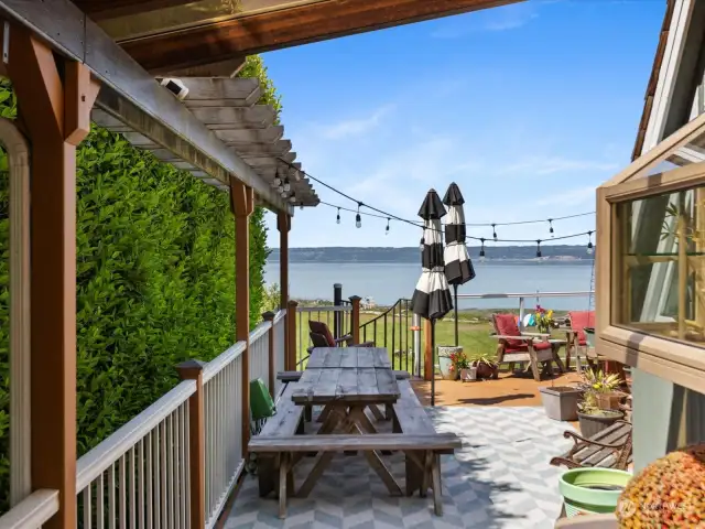Expansive wrap around Deck offers exceptional outdoor living space - entertain, soak up the sun, and enjoy spectacular sunsets EVERY day!