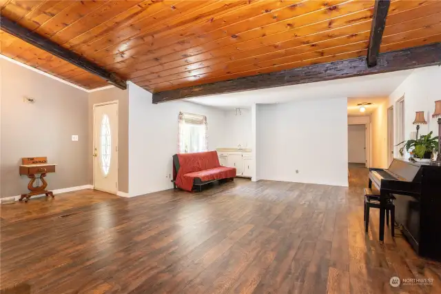 Front door opening to great room, wet-bar never used by seller.  Hall leads to  bedrooms.