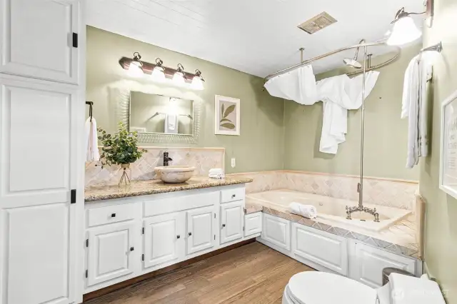 One of the home's 2 baths that features jetted tubs.