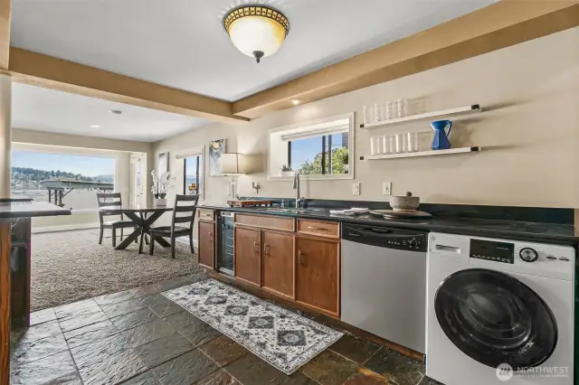 The lower level of the home features a second kitchen, a spacious living area, and is perfect for an extended guest stay or for a multi generational living situation.