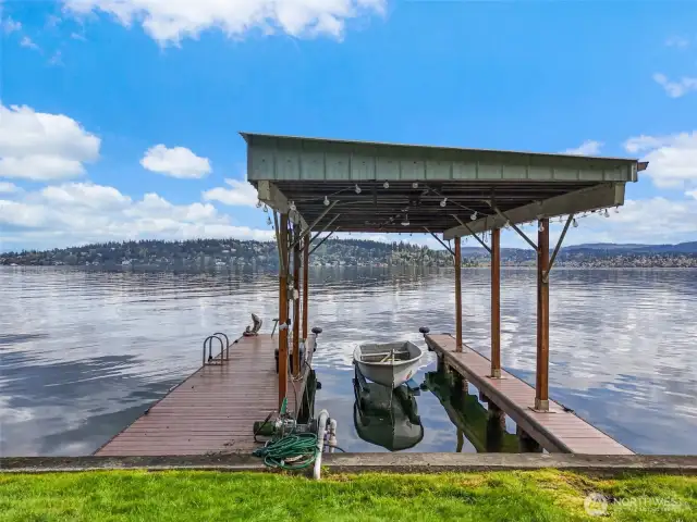 Enjoy your covered moorage and private boat lift.