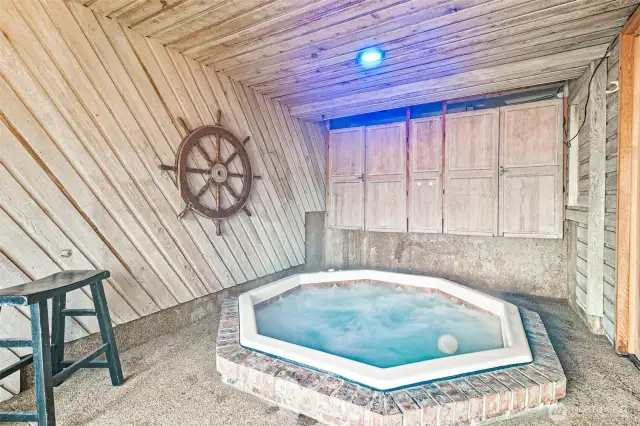 The cabana with hot tub is just a covered breezeway away from the home!