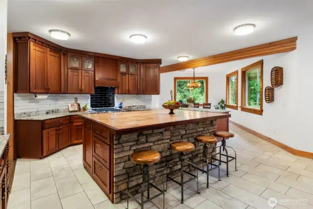 Massive island with tons of storage looking towards dining room.
