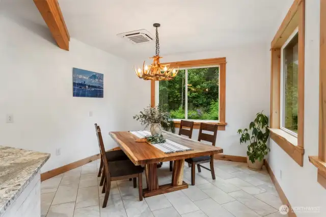 Dining room with Alder window trim Maple live edge sills...both from the property as well!