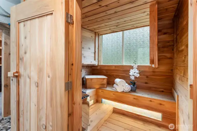 Sauna in primary bathroom...move straight from the open shower into the sauna, close the window cover and unwind!