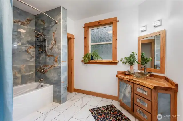 Full bathroom with storage area!