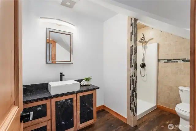 3/4 bathroom off 4th bedroom above garage!