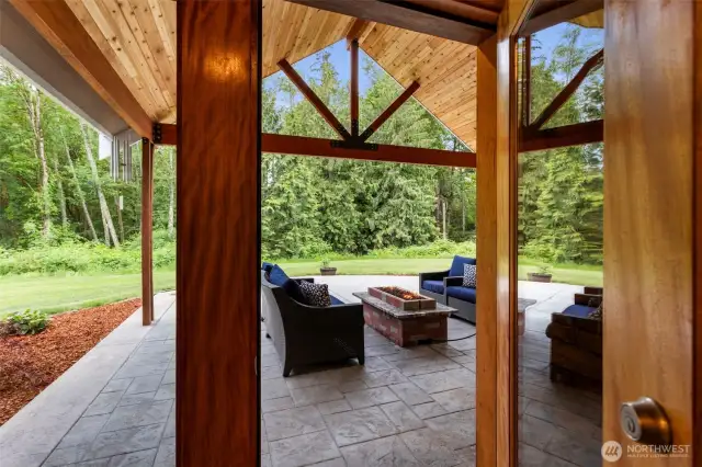 Two sets of double French doors beckoning you to your covered Bach patio!