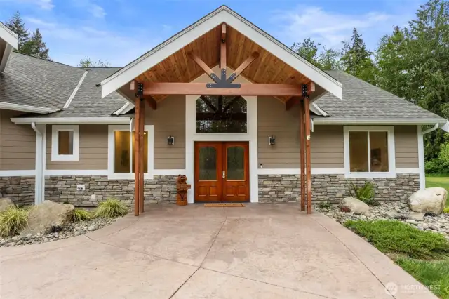 Stamped concrete and a grand double door entry!
