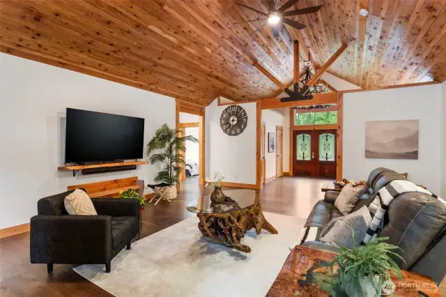 Grand room facing entry, 1/2 bath and coat closet.