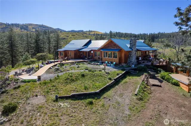 Privacy, 360 degree views and beautiful custom home.