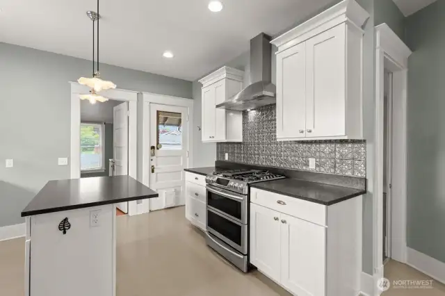 718 B Updated kitchen with leathered finish granite countertops