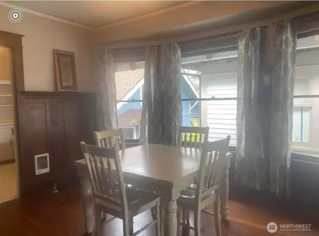 720 B Dining room with original floors and millwork (Photo from seller)