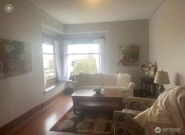 720 B Dining room with original floors (Photo from seller)