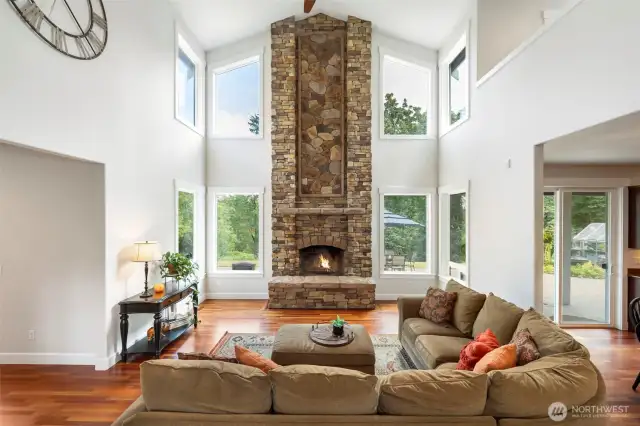 Wood burning floor to ceiling fireplace