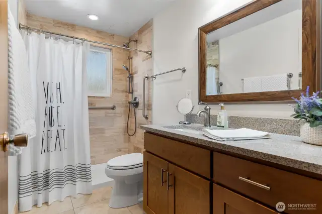 Walk in tile shower on the main floor
