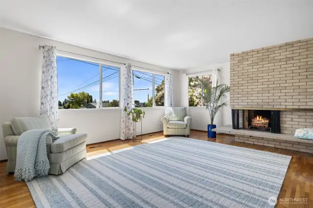 Sun-filled living room w/ fireplace!