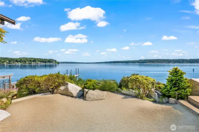 Find your Zen at this breathtaking waterfront retreat nestled at the mouth of Wollochet Bay in the charming Gig Harbor. Expertly designed this masterpiece seamlessly blends Northwest Contemporary aesthetics with a touch of Asian-inspired elegance.