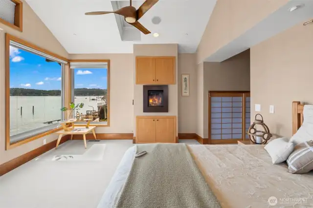 Tucked away for privacy, the owner’s suite is a peaceful retreat with water views, refined finishes, and a calm, coastal vibe. A perfect place to unwind, recharge, and take in the beauty just beyond the windows.