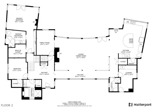 Designed by Brett Draeger Architects, the main floor showcases stunning water views, soaring ceilings, and a seamless, light-filled layout made for elegant living.