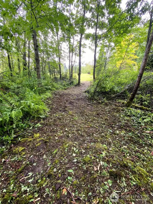 Path from street to golf course