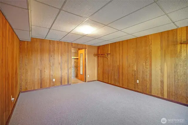 Second bedroom located on lower level with access to the backyard facing the gorgeous lake.