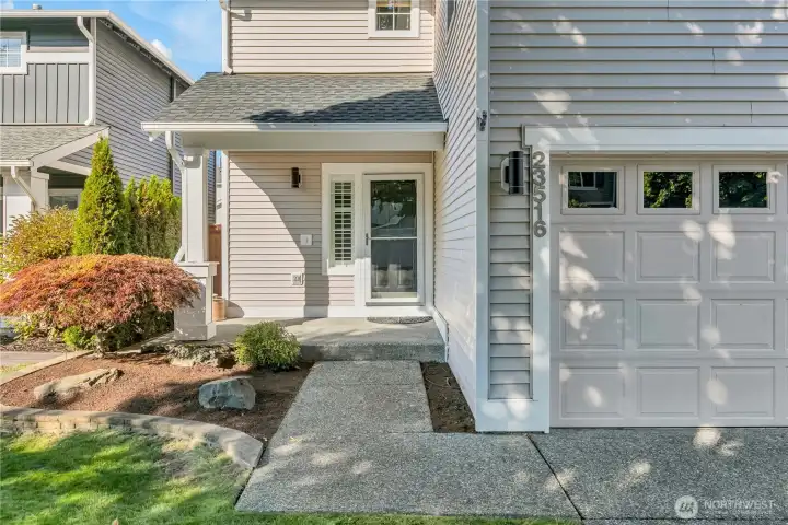 Inviting covered front porch beckons you inside.