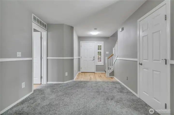 Elegant wainscoting adds timeless character to the great room.