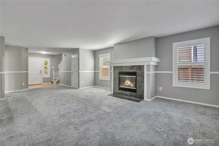 Spacious living room perfect for gathering and relaxation.