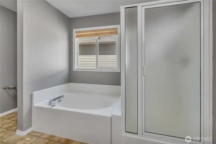 Relaxing soaking tub for the ultimate unwind. Separate shower with clean, modern finishes.