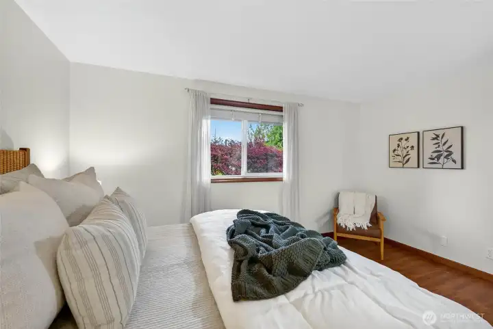 You know the windows that neighbors can see into, so you always have the blinds down? Not this bedroom window, enjoy the beautiful view 24/7. Primary bedroom.