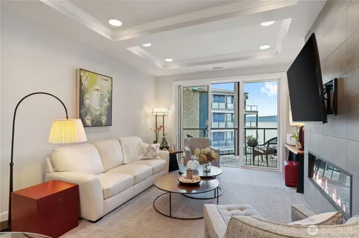 Bright living space, seamless indoor-outdoor flow to the private view patio/deck.