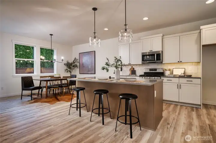 Kitchen & Dining Area - Pics are of a different 2014 plan. Features and colors may differ.