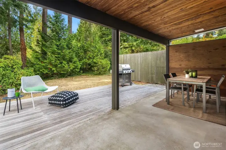 Enjoy this space all year long!  West-facing for sunny summer evening al fresco-dining, and protected enough to enjoy even on a blustery winter afternoon.  The gas-plumbed Weber grill stays!
