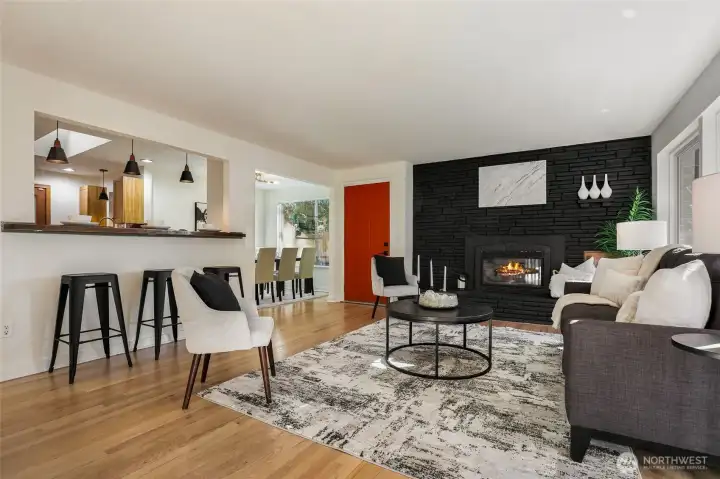 Gas fireplace and kitchen bar.