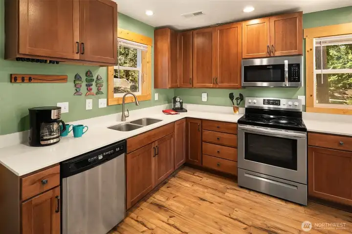 Beautifully updated home includes stainless steel appliances, ample cabinetry in kitchen, sparkly clean and ready for you to enjoy!