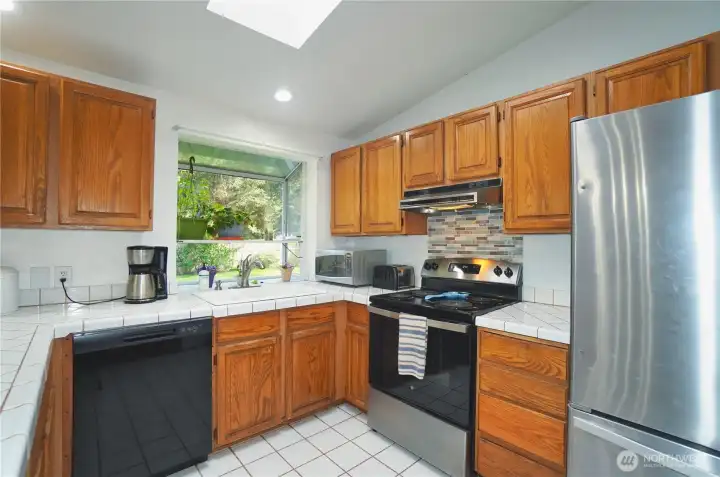 Kitchen with newer appliances,