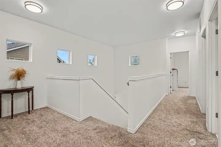 Upstairs landing leading two all bedrooms and baths.