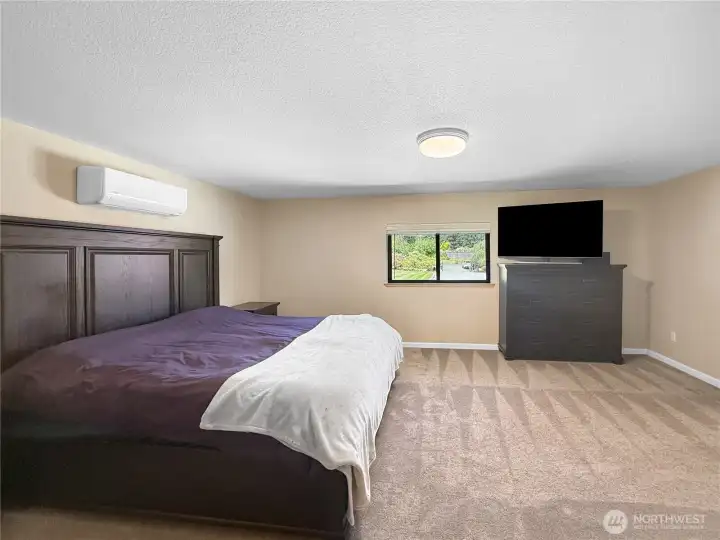 Private primary suite separated for added privacy and relaxation