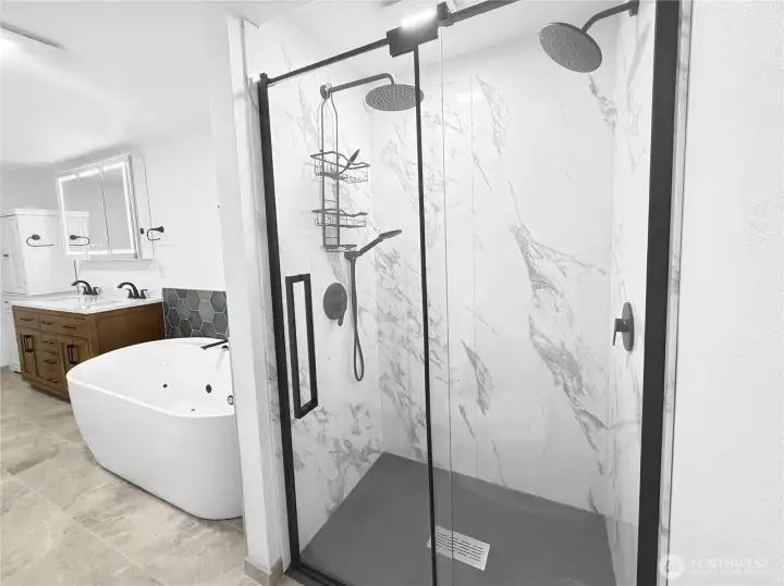 Walk-in double-head shower with modern design and upgraded fixtures
