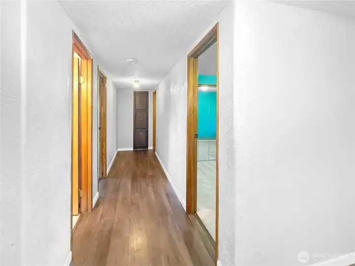 Split floorplan with additional bedrooms on opposite side of home