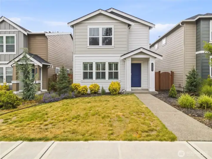 Front view of home, so inviting! What a great little development this home is in. Front view of home, so inviting! What a great little development this home is in.