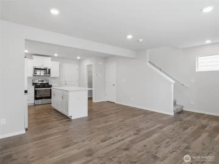 View from your living room to kitchen, all white and clean! Walk-in pantry and storage under the stairs are both so convenient. View from your living room to kitchen, all white and clean! Walk-in pantry and storage under the stairs are both so convenient.